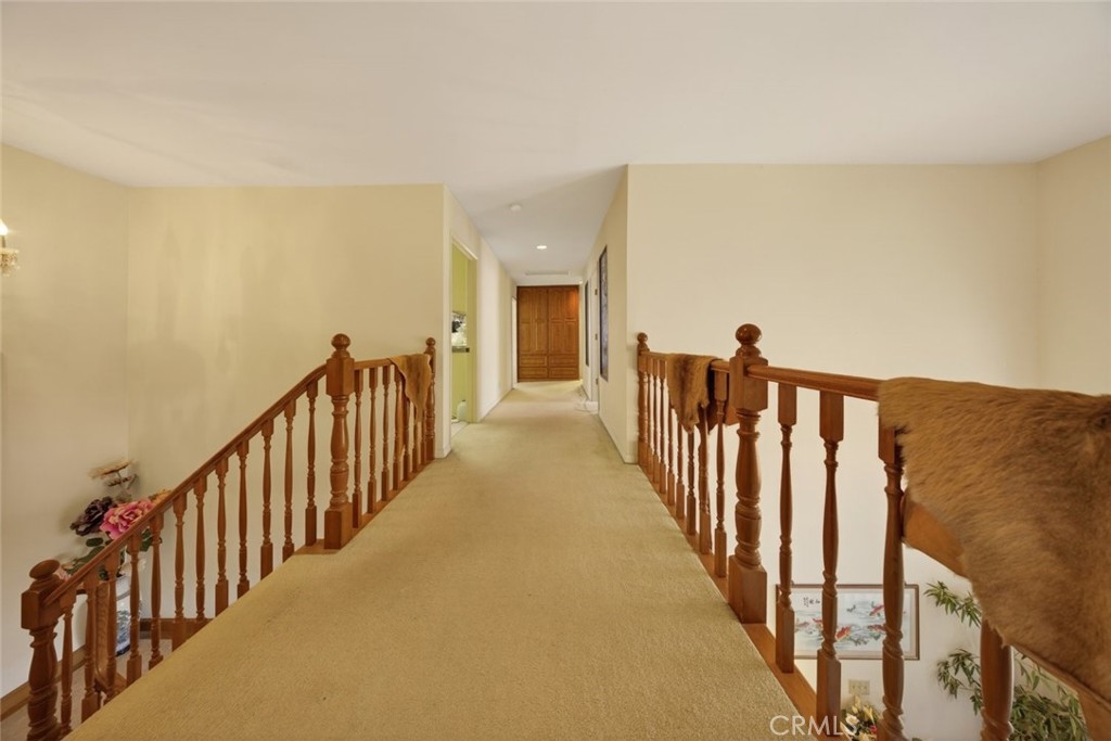 1978 Starvale Road Glendale, CA 91207 - Photo 30 of 75 a view of a hallway with wooden floor and stairs