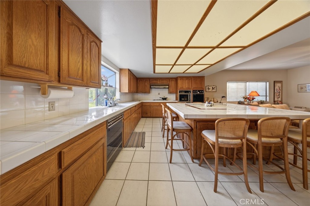 1978 Starvale Road Glendale, CA 91207 - Photo 45 of 75 a open kitchen with stainless steel appliances granite countertop a sink and cabinets