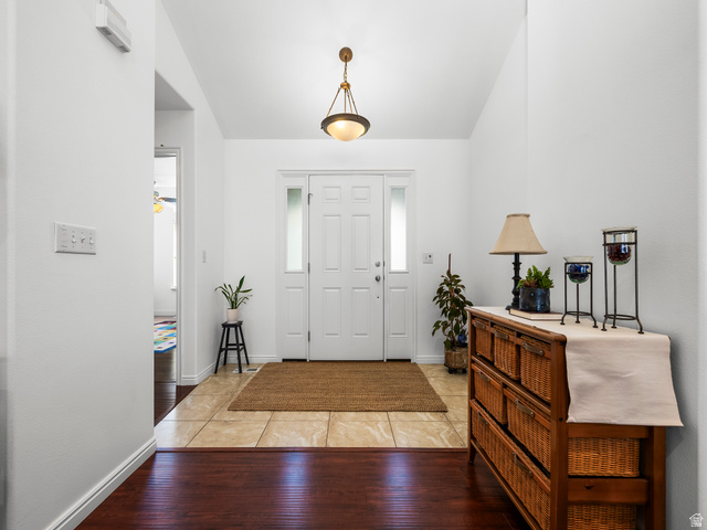 1602 Renaissance Way Springville, UT 84663 - Photo 3 of 42 Entryway with a paneled door, sidelight windows, and an overhead pendant light fixture