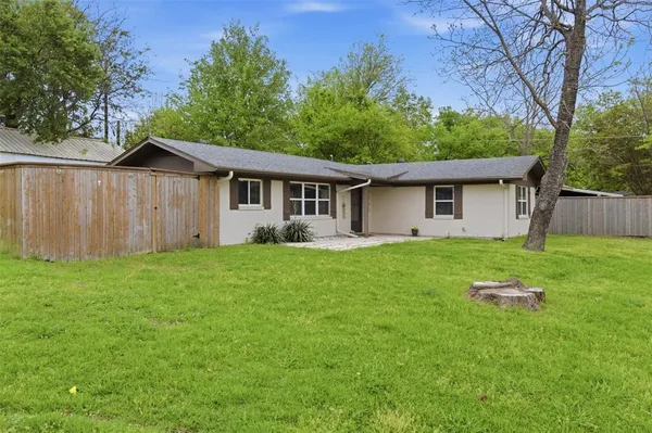 a house view with a garden space