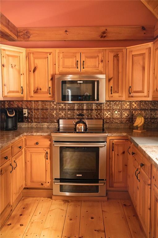 192 Long Hill Road Sebago, ME 04029 - Photo 8 of 35 U-shaped kitchen with lots of...