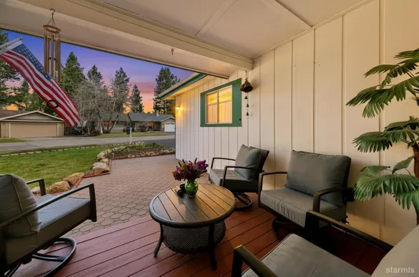 a outdoor living space with furniture and garden view