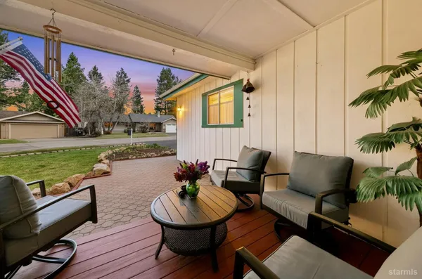 a outdoor living space with furniture and garden view