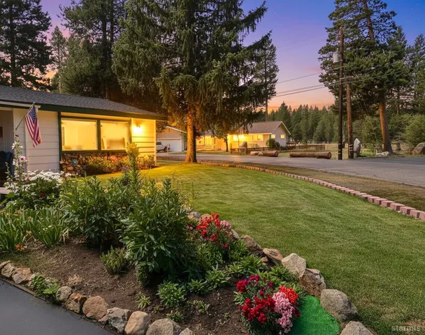 a view of a garden with a fountain