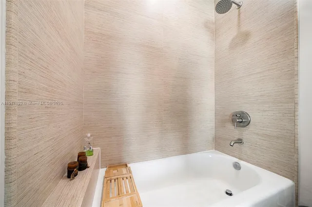 a bathroom with a white bath tub