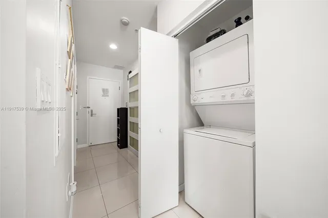 a view of hallway with washer and dryer