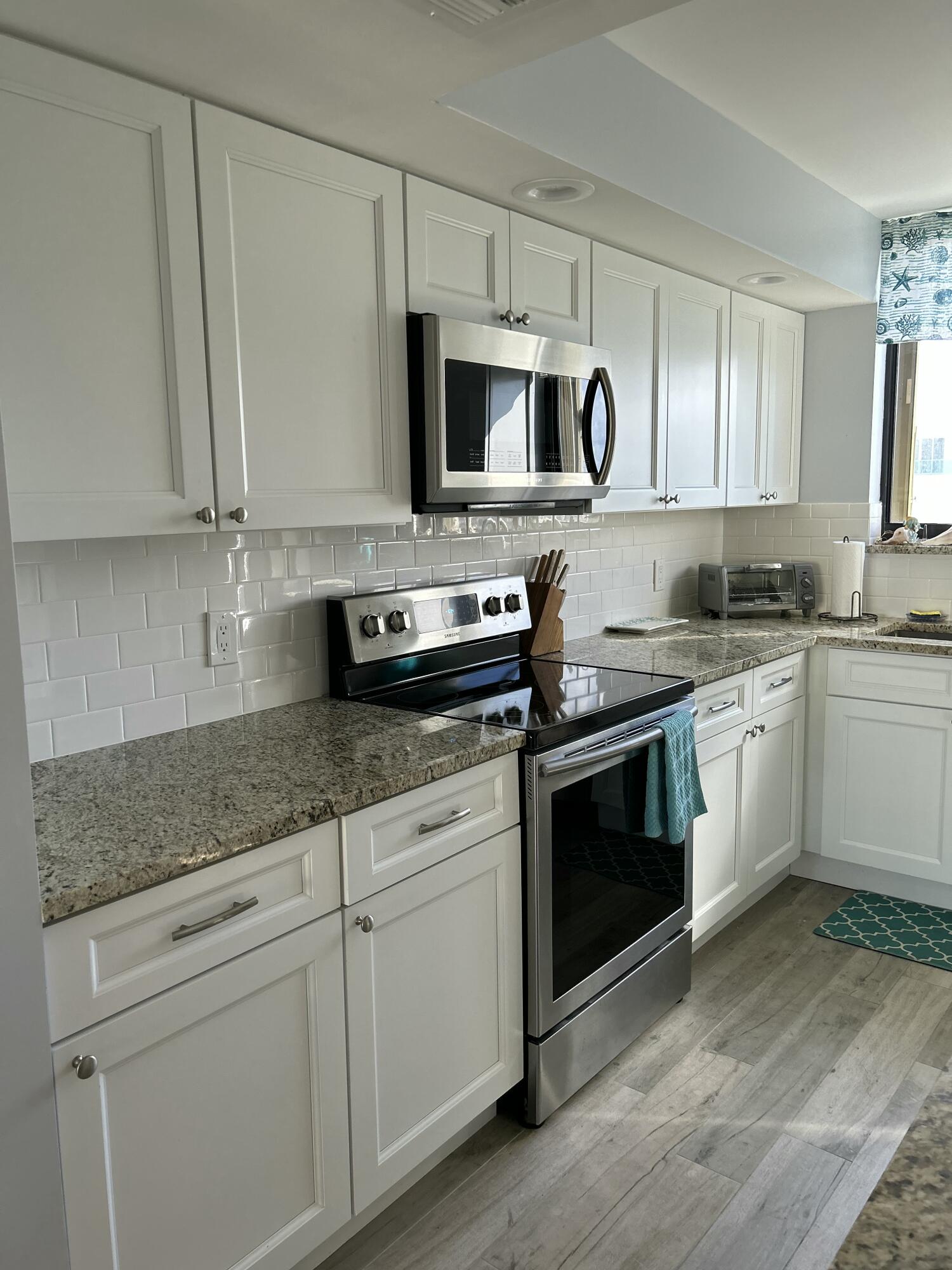100 Ocean Trail Way, Unit 801 Jupiter, FL 33477 - Photo 12 of 45 KITCHEN