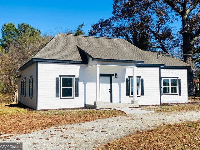 a front view of a house with a space