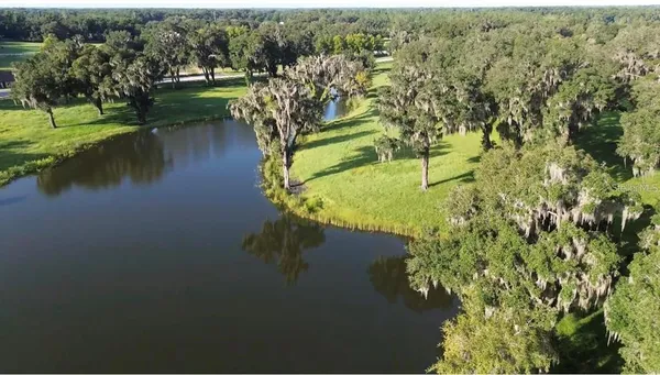 a view of a lake with a house