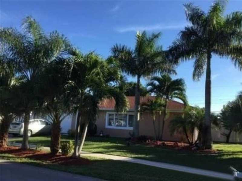 127 Winged Foot Lane Boca Raton, FL 33431 - Photo 1 of 6 a view of a yard in front of a house