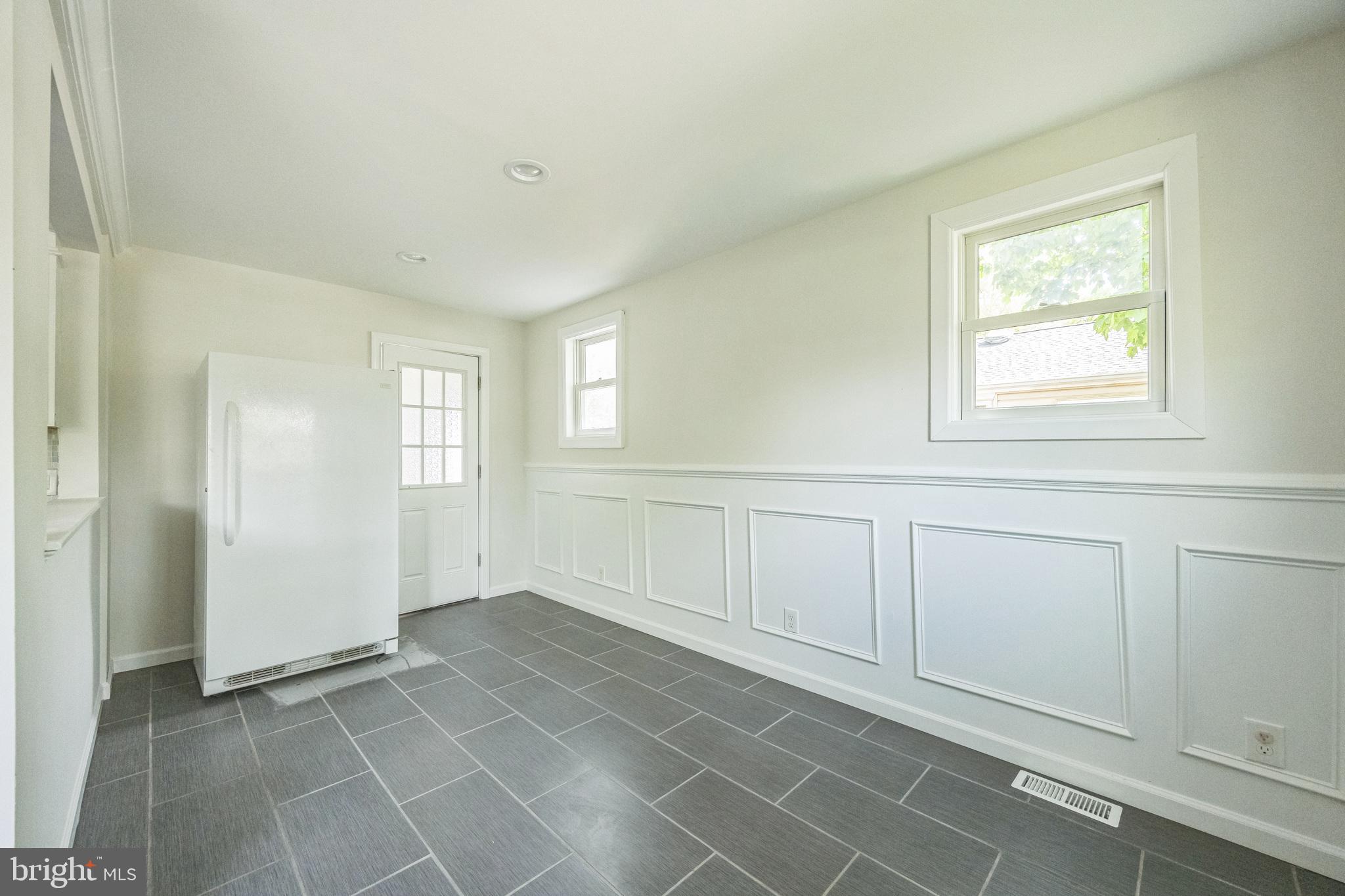 76 Edison Road Cherry Hill, NJ 08034 - Photo 10 of 29 an empty room with windows