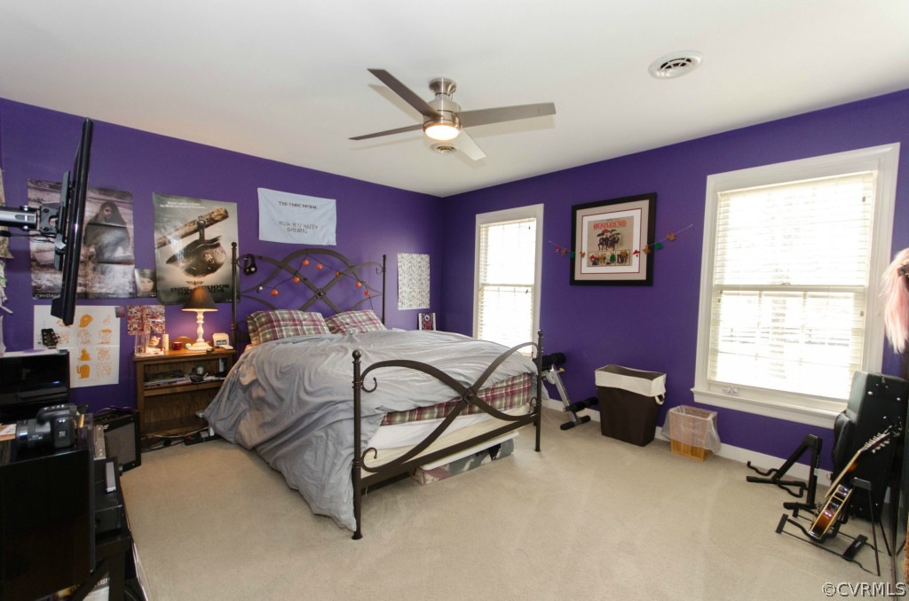 2209 Kings Lynn Road Midlothian, VA 23113 - Photo 18 of 24 a bedroom with a bed and a window