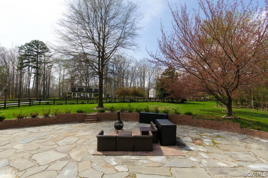 2209 Kings Lynn Road Midlothian, VA 23113 - Photo 3 of 24 a view of a garden with patio
