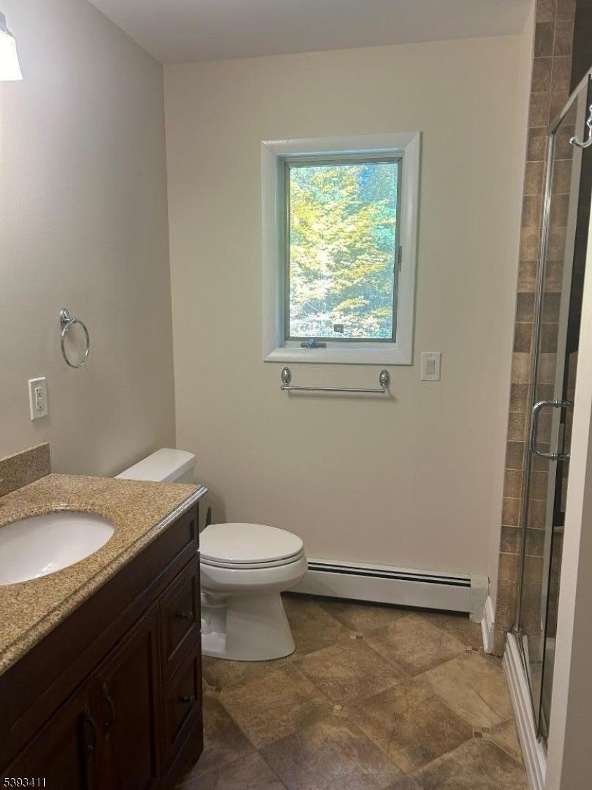 102 Drakestown Road Hackettstown, NJ 07840 - Photo 16 of 28 a bathroom with a granite countertop sink toilet and a mirror
