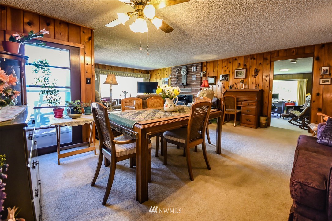 5425 Blvd Ext Road Southeast Olympia, WA 98501 - Photo 17 of 29 a view of a dining room with furniture window and outside view
