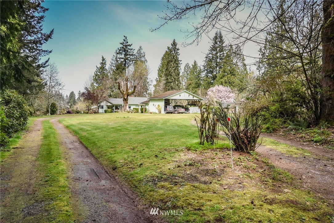 5425 Blvd Ext Road Southeast Olympia, WA 98501 - Photo 3 of 29 a view of a park with large trees