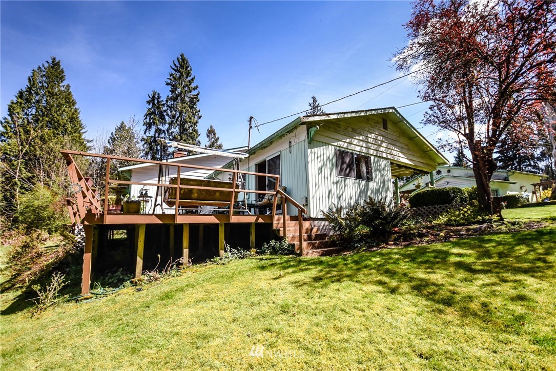 5425 Blvd Ext Road Southeast Olympia, WA 98501 - Photo 29 of 29 a front view of a house with a yard