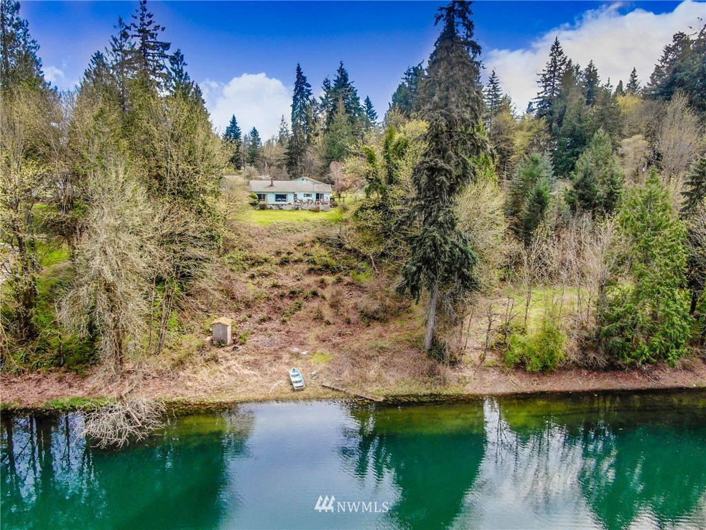 5425 Blvd Ext Road Southeast Olympia, WA 98501 - Photo 6 of 29 a view of a lake with houses