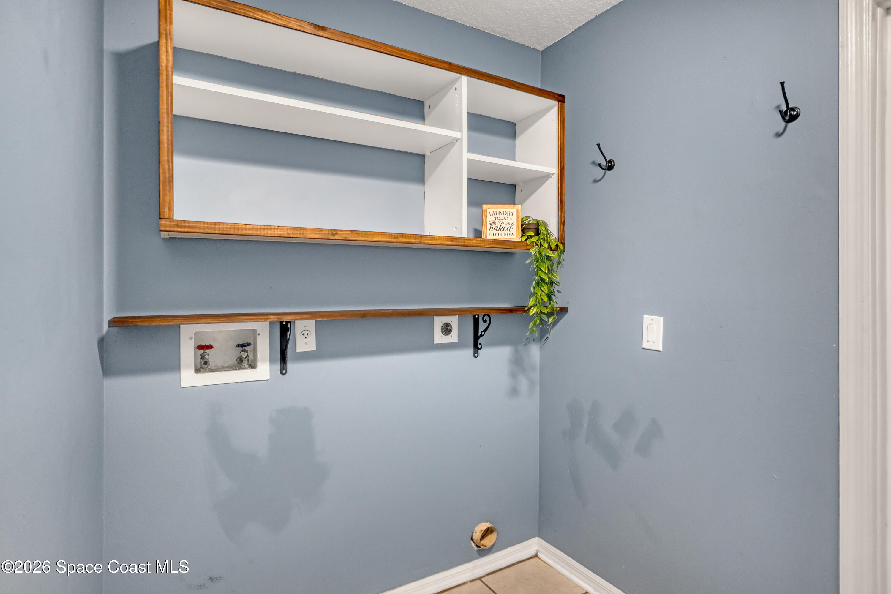 3363 Echo Ridge Place Cocoa, FL 32926 - Photo 29 of 45 laundry