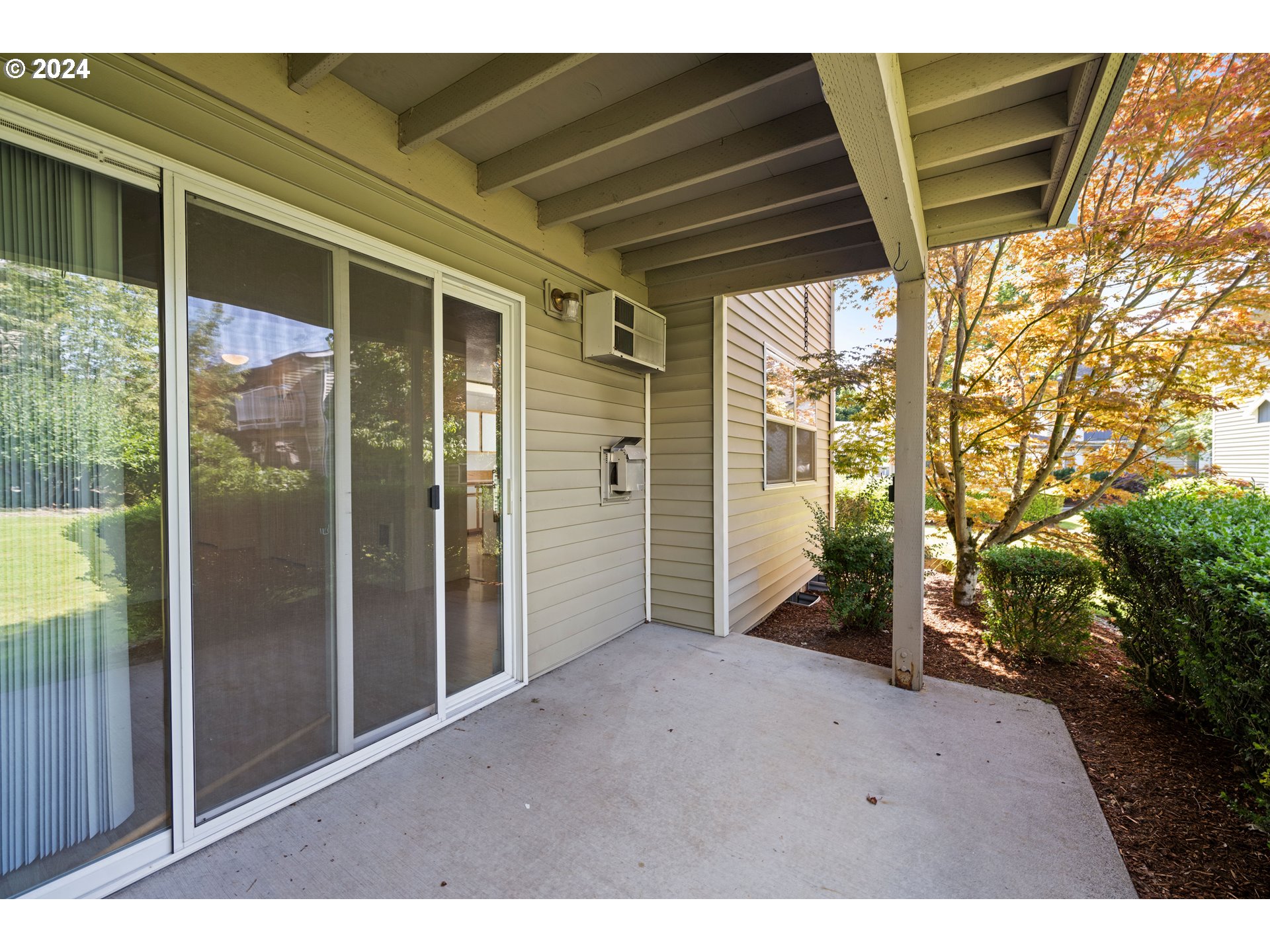 4744 West Powell Boulevard, Unit 127 Gresham, OR 97030 - Photo 29 of 37 a backyard of a house with seating space