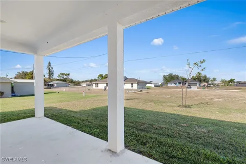 a view of swimming pool with outdoor seating