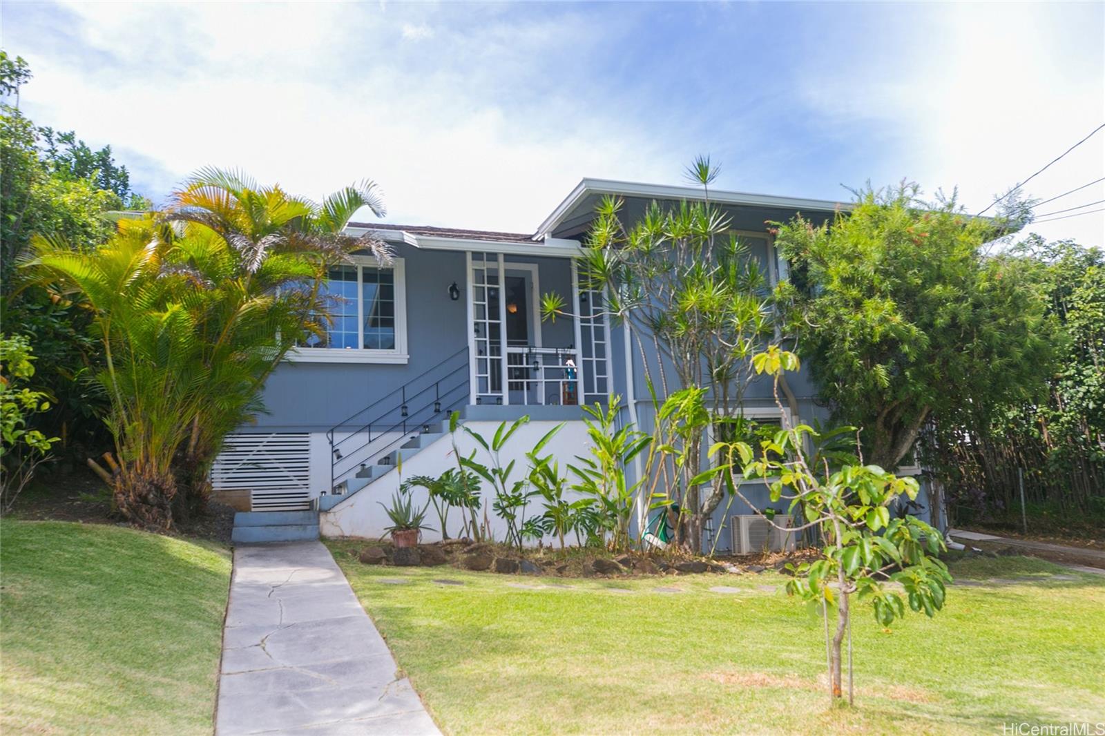 2523 Pamoa Road Honolulu, HI 96822 - Photo 1 of 1 a front view of a house with a yard