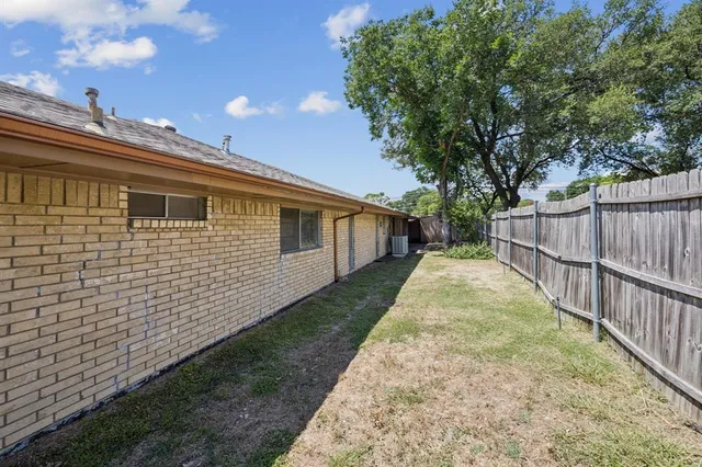 a view of a backyard with a garden