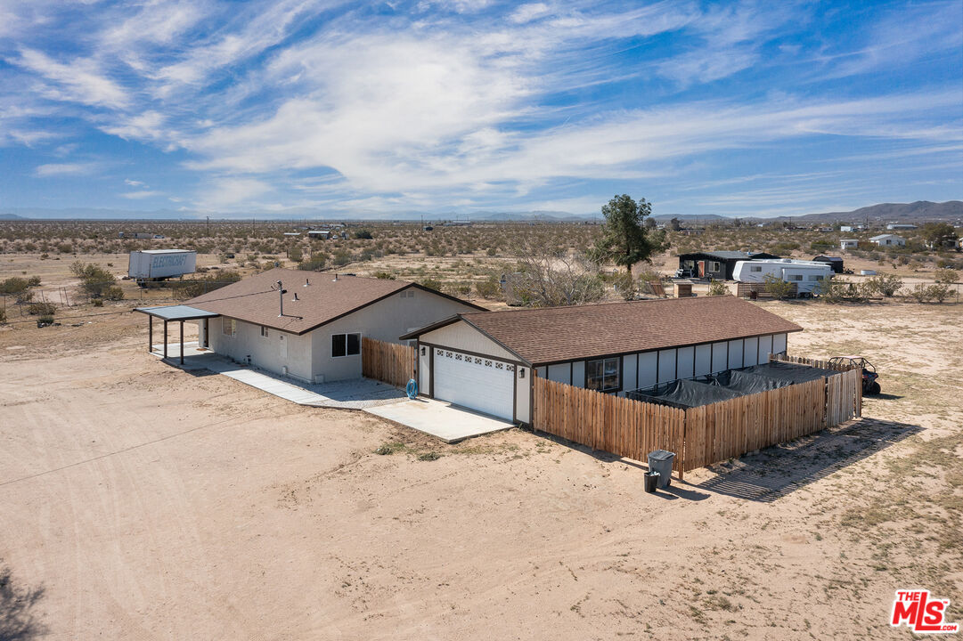 60777 Adele Road Landers, CA 92285 - Photo 24 of 43 a view of a terrace with wooden fence
