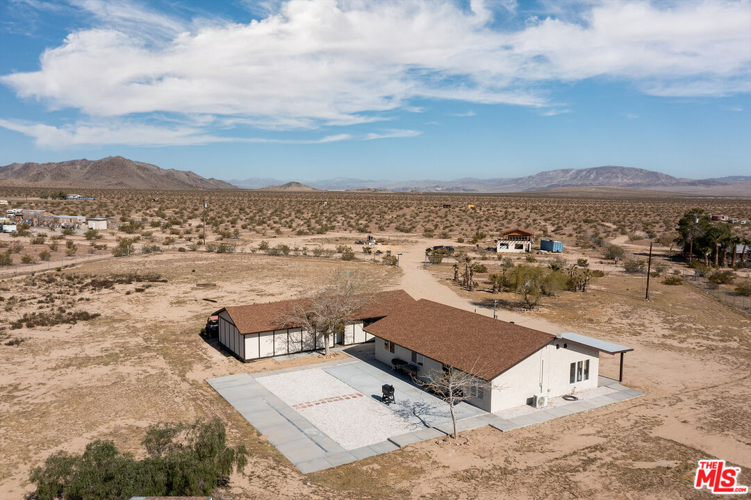 60777 Adele Road Landers, CA 92285 - Photo 5 of 43 an aerial view of residential houses with outdoor space