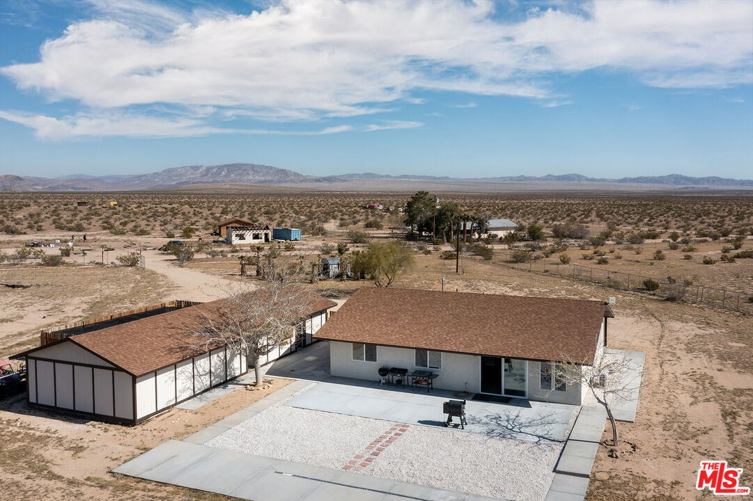 60777 Adele Road Landers, CA 92285 - Photo 6 of 43 a aerial view of a house with a terrace