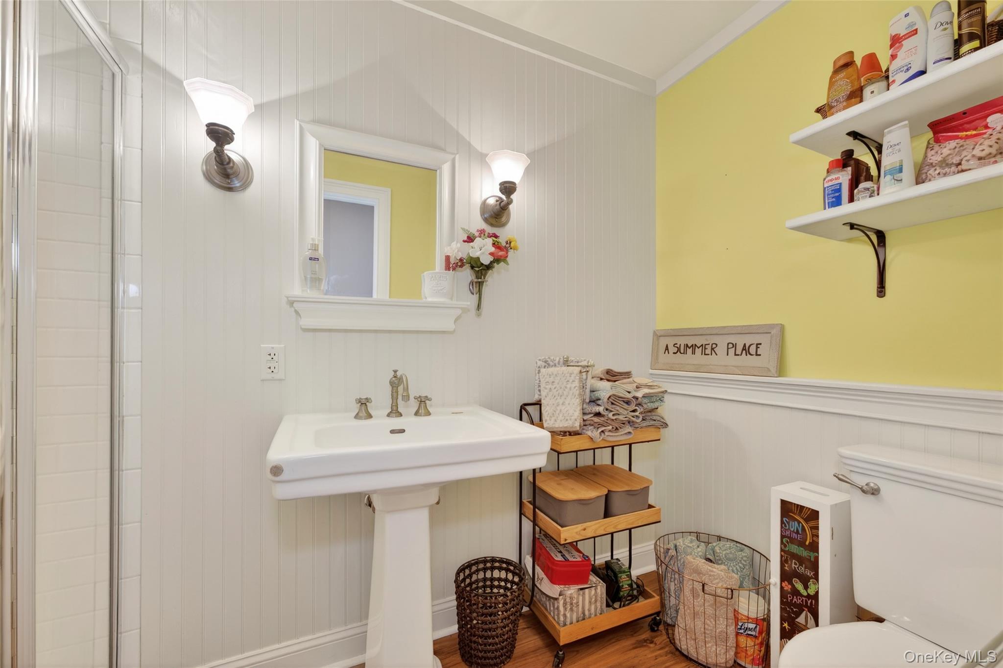 465 Schalck Road Narrowsburg, NY 12764 - Photo 14 of 31 a bathroom with a sink mirror and toilet