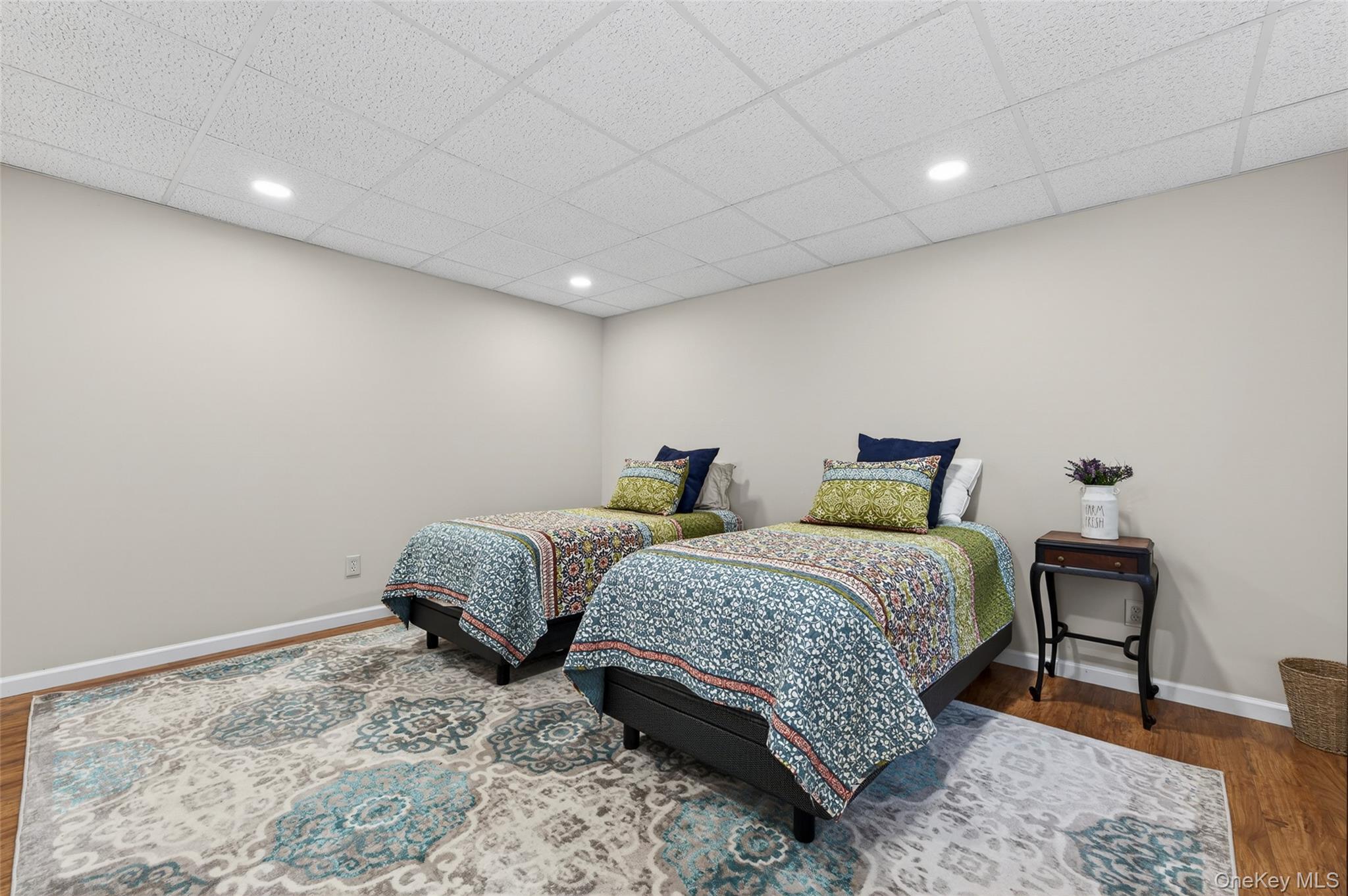 465 Schalck Road Narrowsburg, NY 12764 - Photo 25 of 31 a bedroom with two beds and a lamp