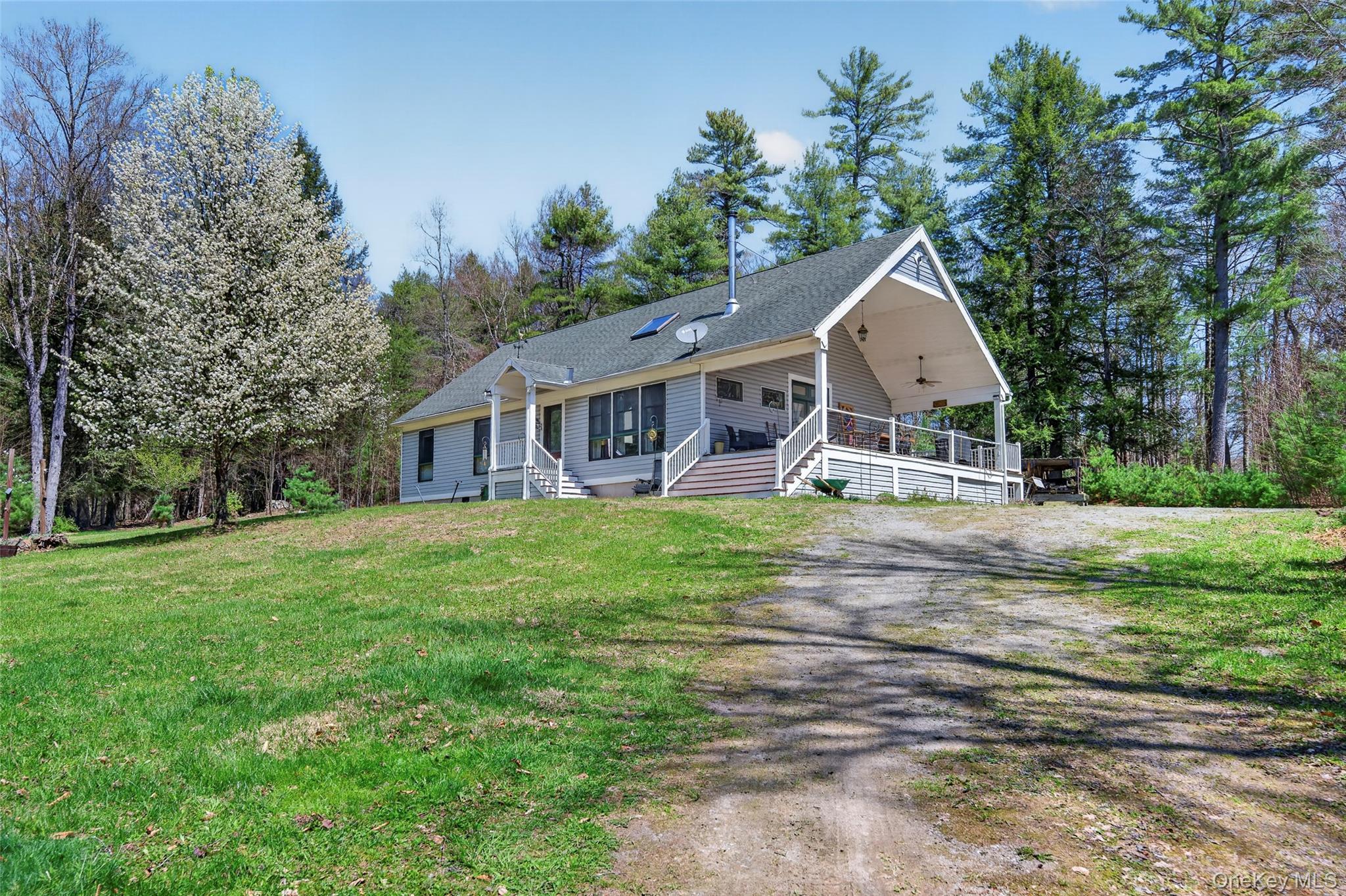 465 Schalck Road Narrowsburg, NY 12764 - Photo 28 of 31 a view of a house with a yard
