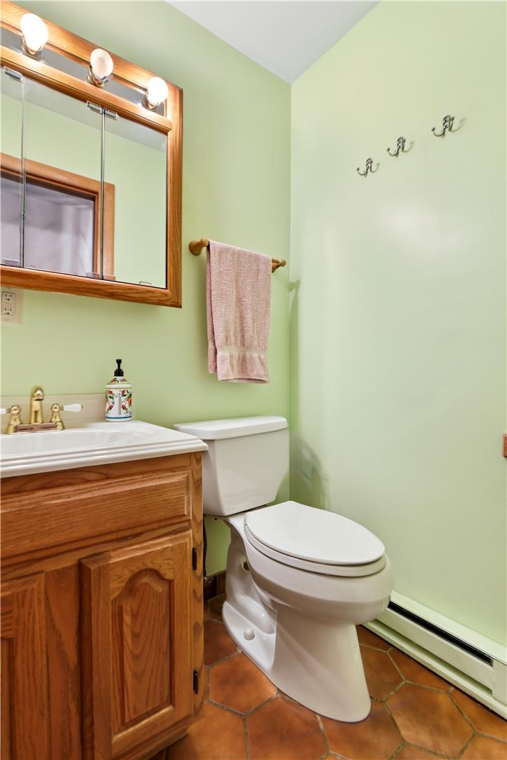3303 Barklay Road Whitehall, PA 18052 - Photo 15 of 31 Functional full bathroom featuring practical storage and durable flooring.