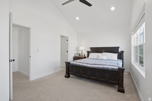 11531 Engelmann Drive Draper, UT 84020 - Photo 13 of 31 Vaulted ceiling bedroom with light-colored carpeting and bright white walls