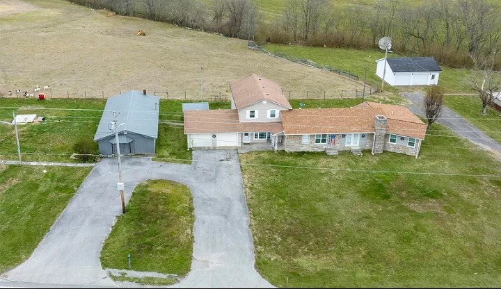 4426 Glasgow Road Burkesville, KY 42717 - Photo 24 of 24 an aerial view of a house with swimming pool garden and patio