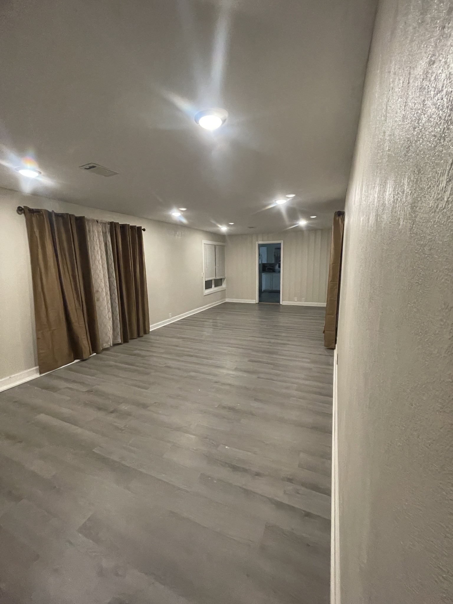 4426 Glasgow Road Burkesville, KY 42717 - Photo 5 of 24 a view of a hallway with a room