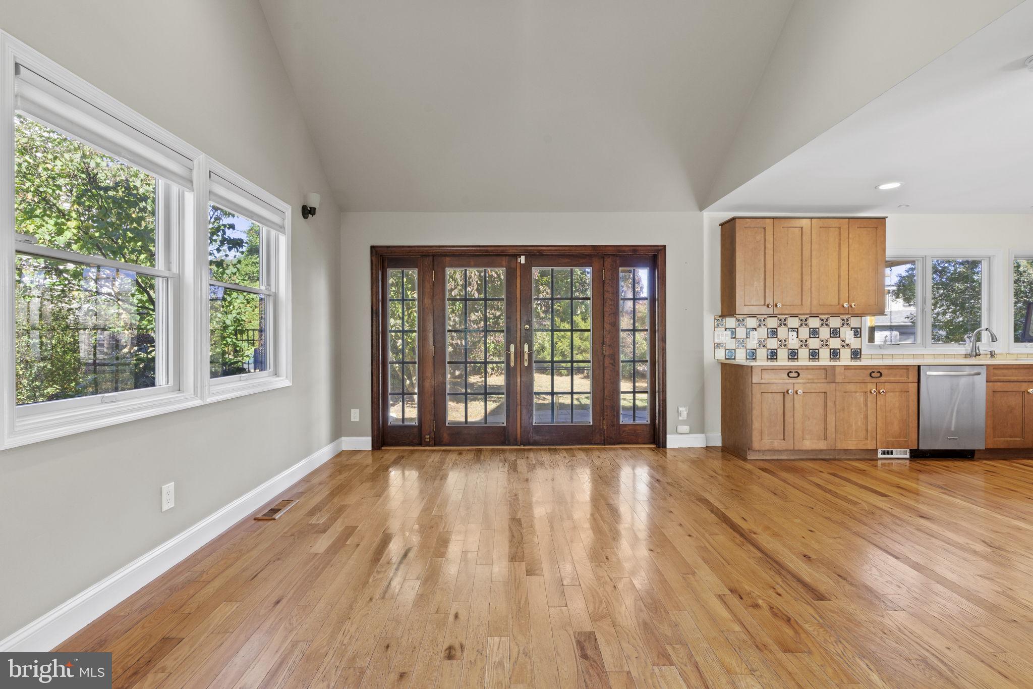 1007 Nicholson Road Wynnewood, PA 19096 - Photo 11 of 29 a view of an empty room with a window and wooden floor