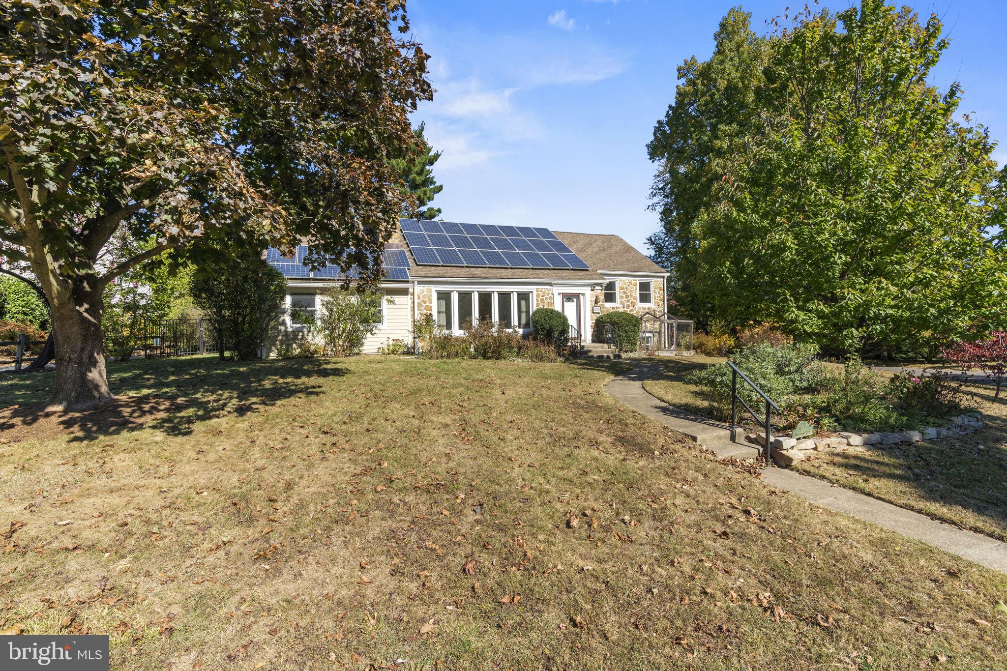 1007 Nicholson Road Wynnewood, PA 19096 - Photo 2 of 29 a front view of a house with a yard