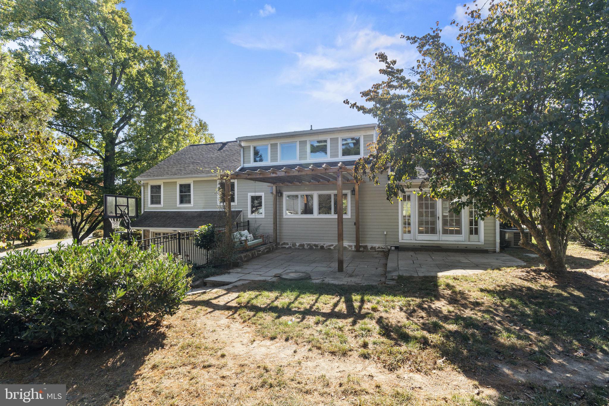 1007 Nicholson Road Wynnewood, PA 19096 - Photo 28 of 29 a front view of a house with a yard