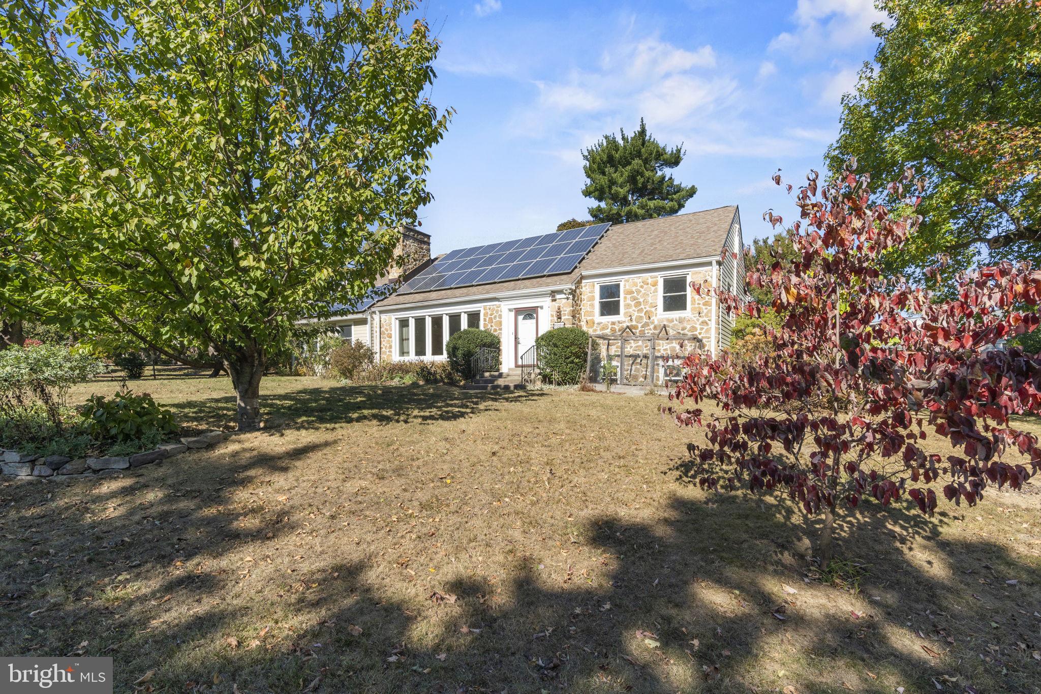 1007 Nicholson Road Wynnewood, PA 19096 - Photo 3 of 29 a house with trees in front of it