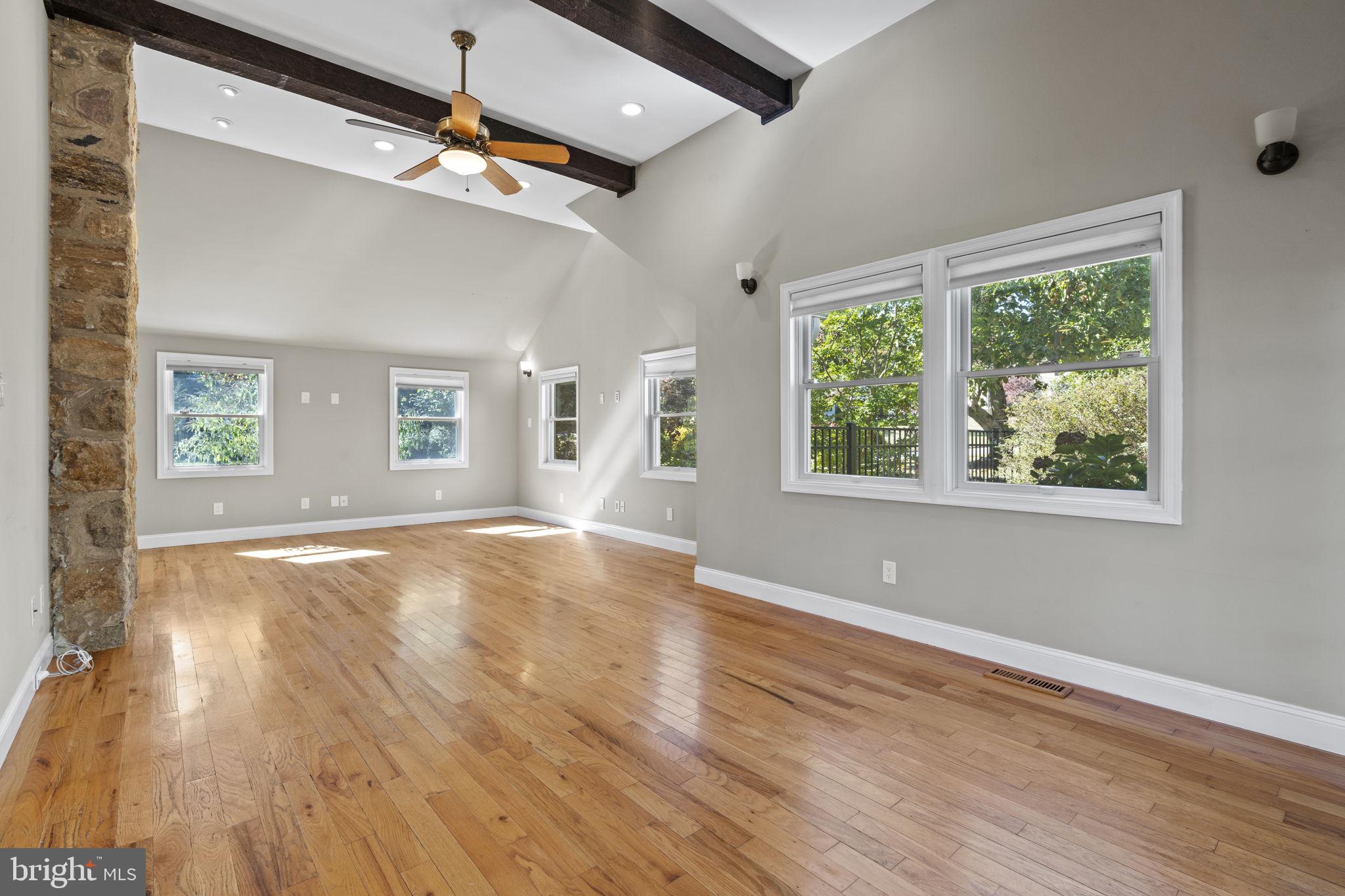 1007 Nicholson Road Wynnewood, PA 19096 - Photo 9 of 29 wooden floor in an empty room with a window