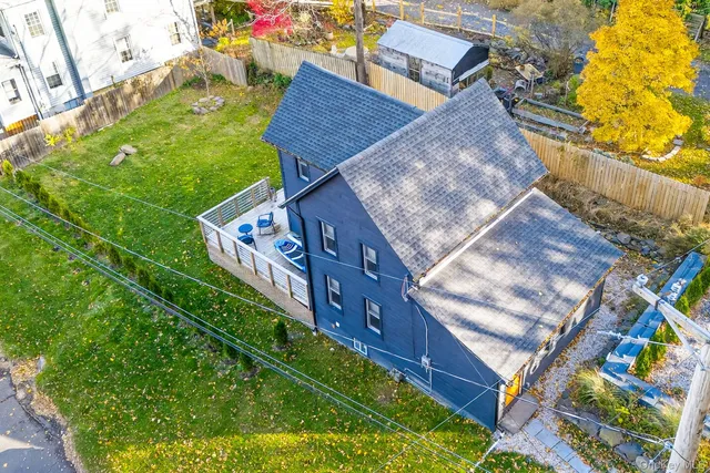 a spacious bedroom with a large bed and a window