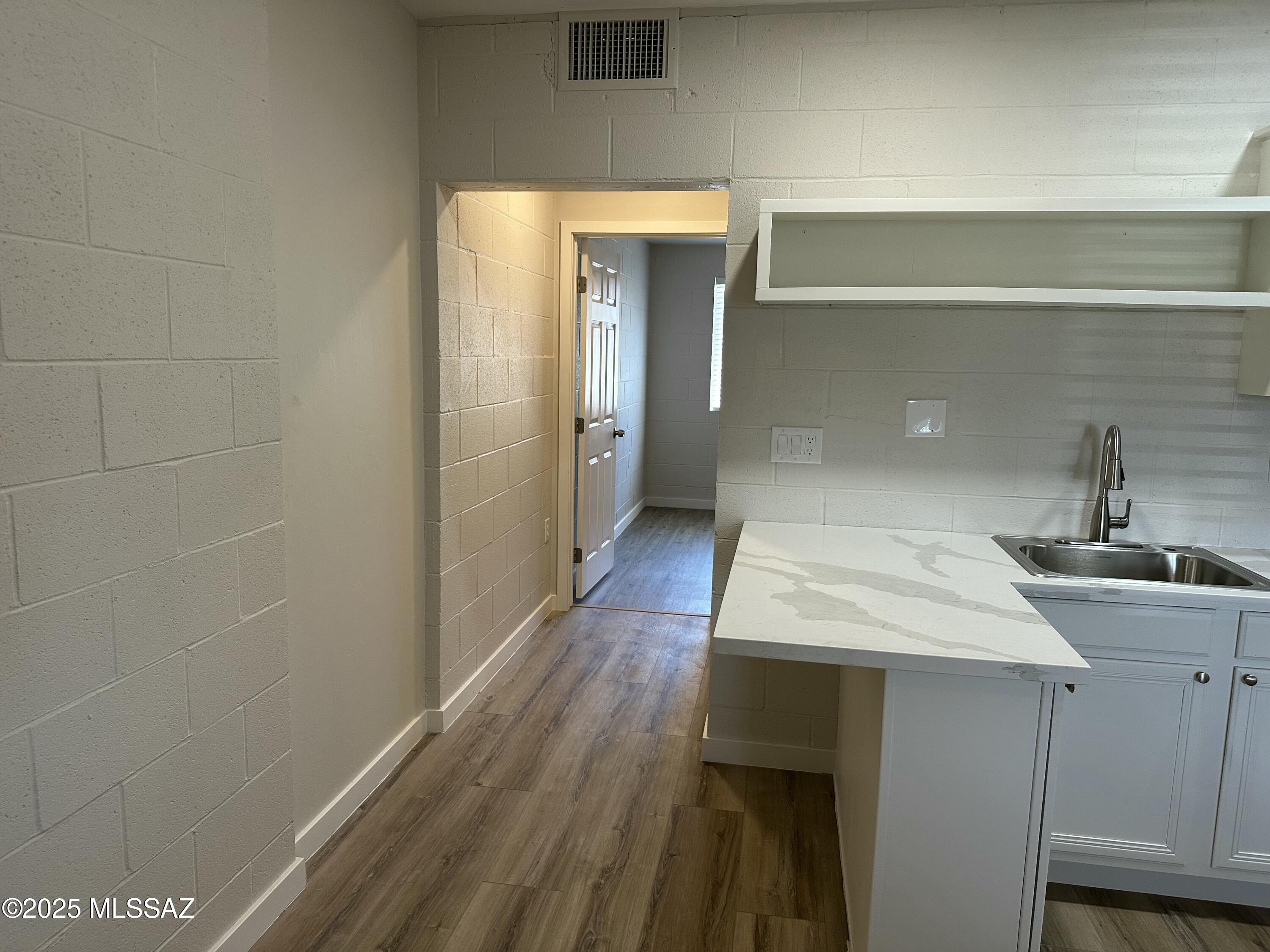 645 East Mabel Street Tucson, AZ 85705 - Photo 19 of 22 a bathroom with a sink and mirror
