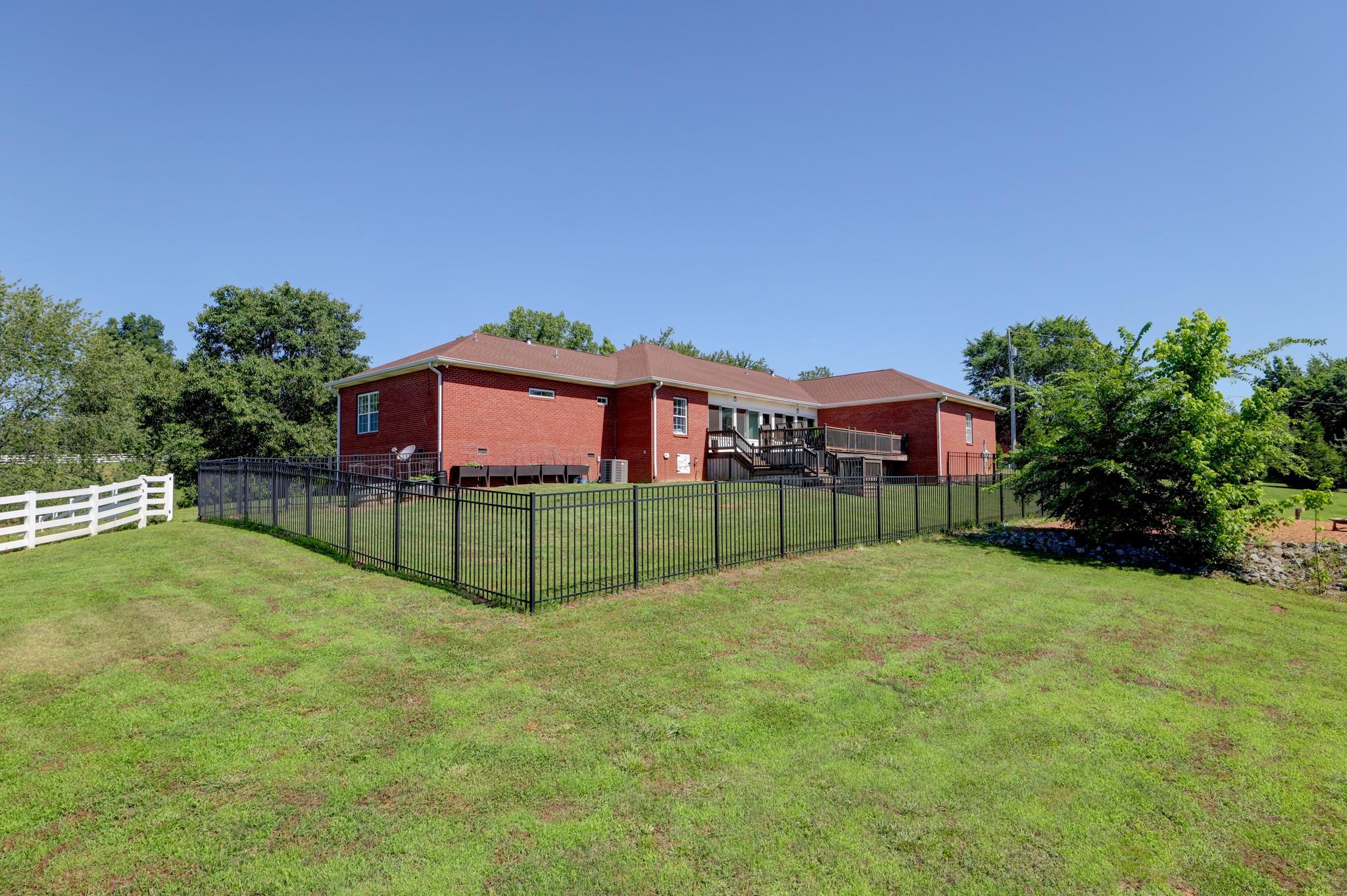 2251 Davidson Graveyard Road Clarksville, TN 37043 - Photo 72 of 78 a view of a house with a yard and a garden