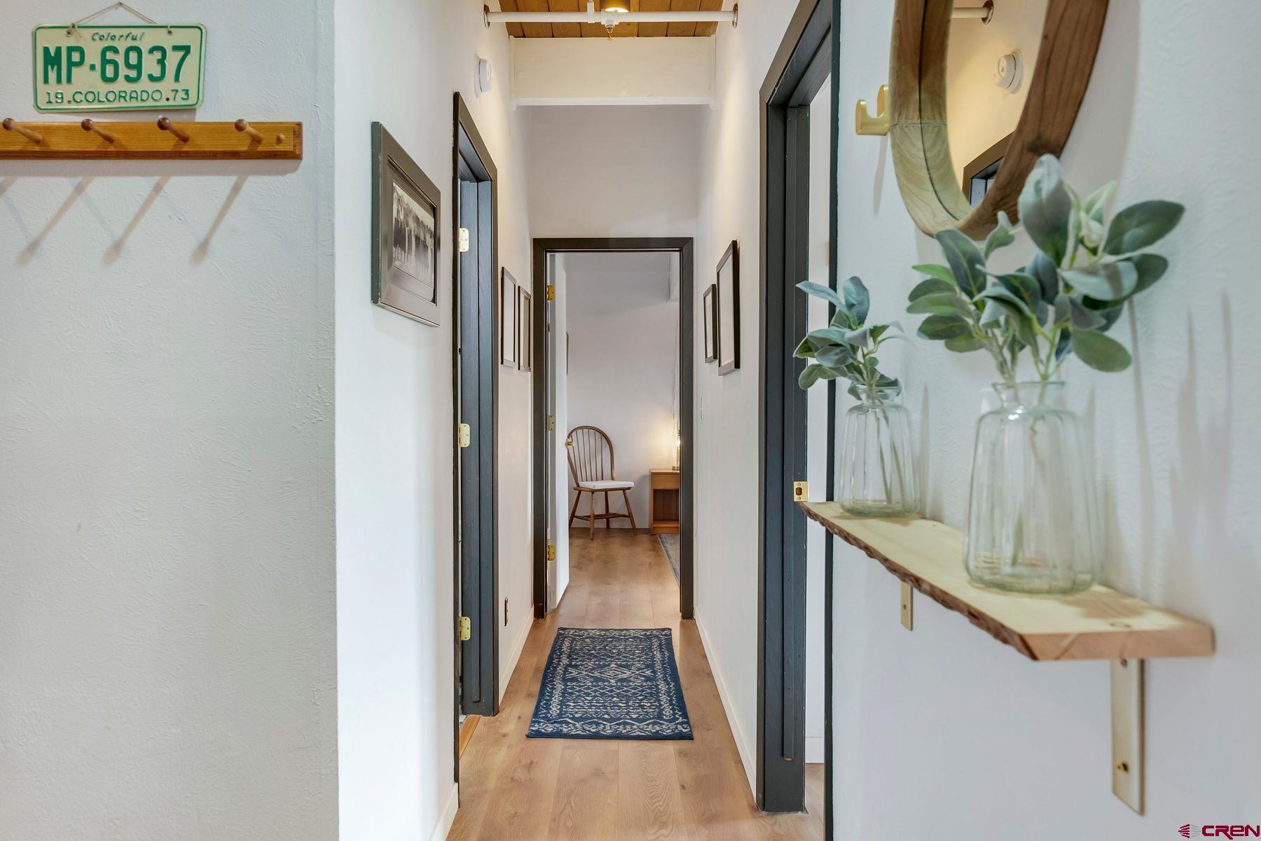 32 Hunter Hill Road, Unit B204 Crested Butte, CO 81225 - Photo 11 of 33 a picture of a door and a table