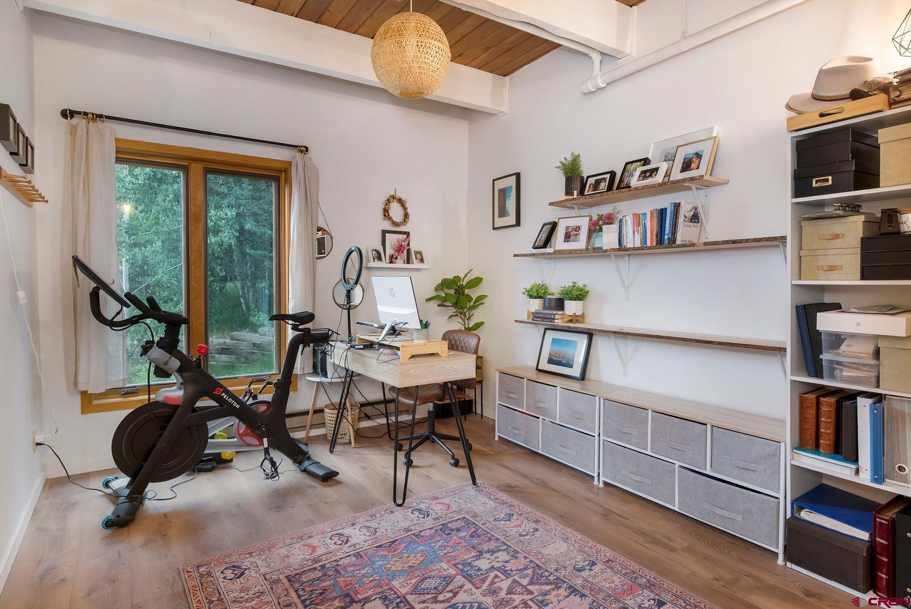 32 Hunter Hill Road, Unit B204 Crested Butte, CO 81225 - Photo 20 of 33 a view of a workspace with furniture and toys
