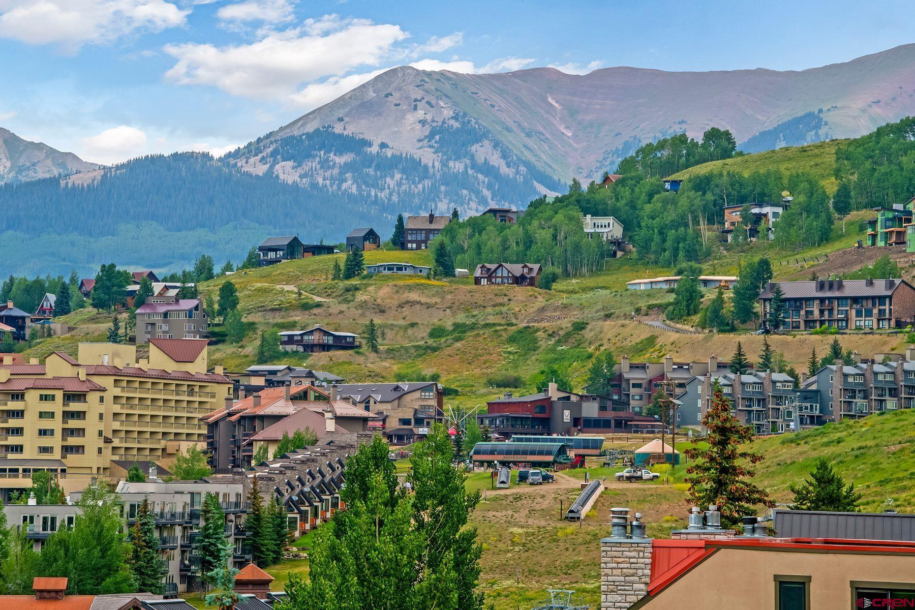 32 Hunter Hill Road, Unit B204 Crested Butte, CO 81225 - Photo 26 of 33 an aerial view of residential houses with outdoor space and river view