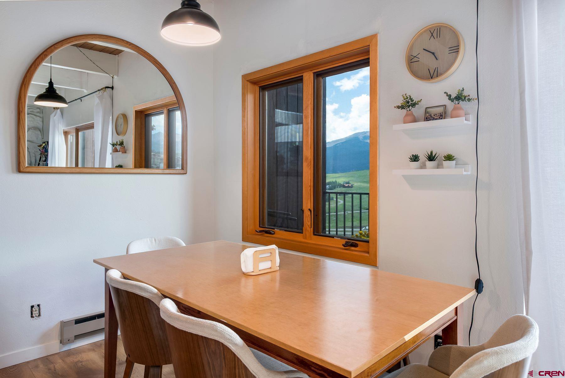 32 Hunter Hill Road, Unit B204 Crested Butte, CO 81225 - Photo 10 of 33 a view of a dining room with furniture