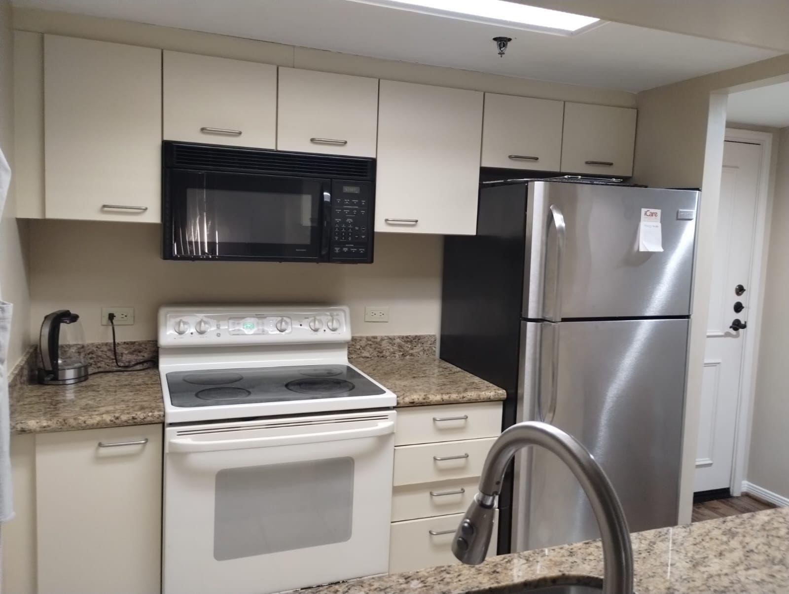 3525 Sage Road, Unit 201 Houston, TX 77056 - Photo 9 of 11 The kitchen view. Refrigerator included.